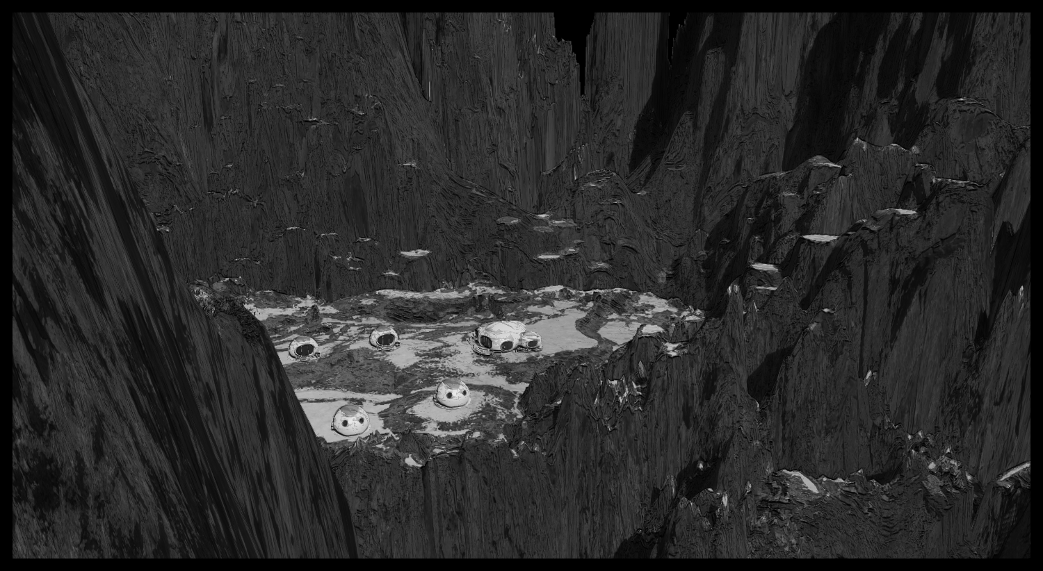 A distant view of the village spread across a rocky valley